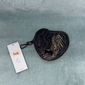 Lug Heart Pouch in the Tropical Fog pattern.